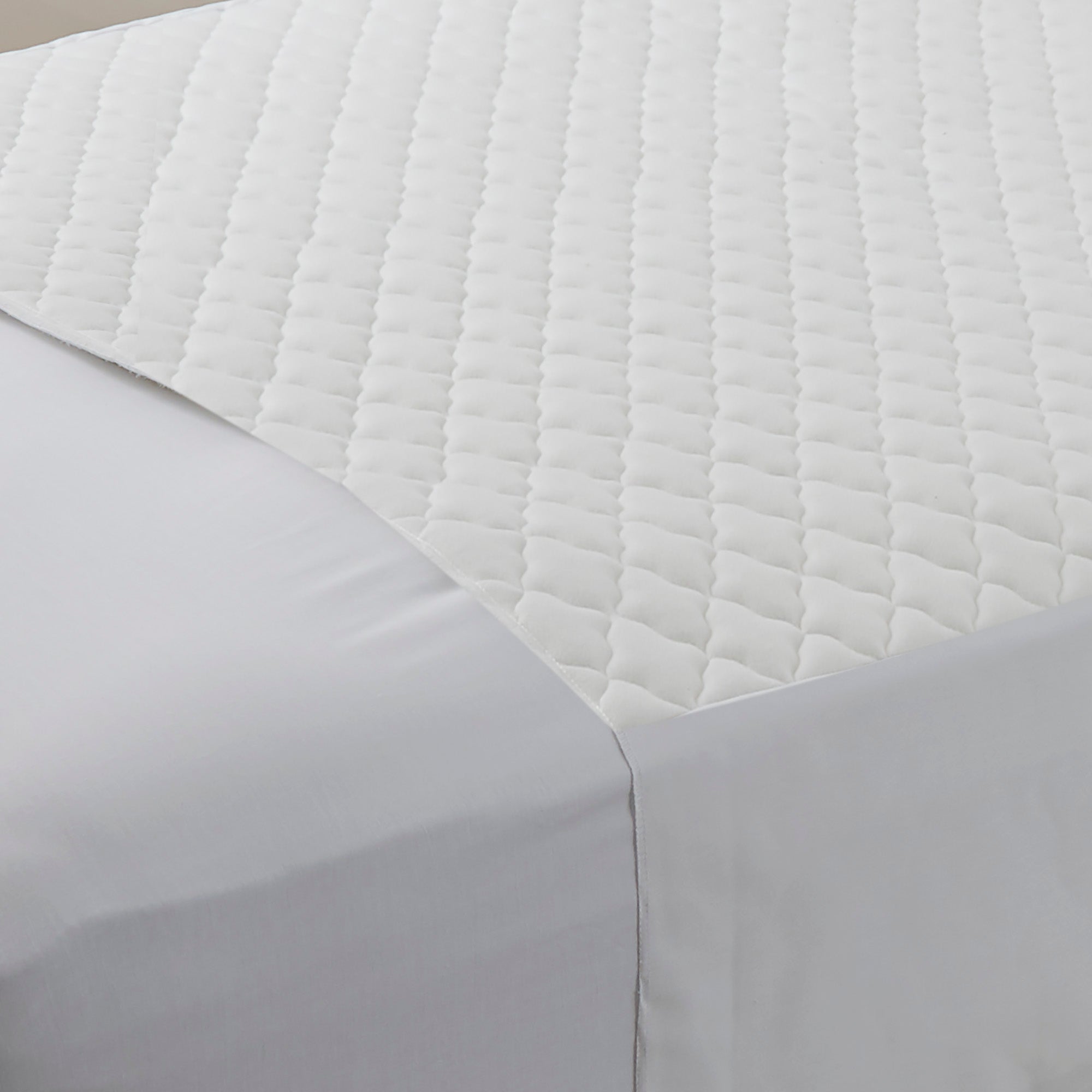 Linen Saver Bed Pad With Tuck Ins